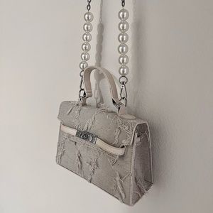 COPY - White bag with distressed material